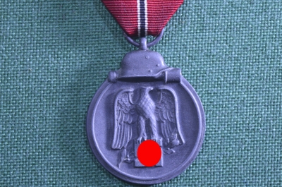 Медаль "За зимнюю кампанию на Востоке 1941/42" (мороженое мясо). Лента, клеймо 58. Оригинал.