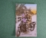 Открытка старинная цветная "Военный мотоциклист с девушкой". Франция. Начало 20-го века.