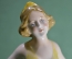 Фарфоровая статуэтка "танцующая девушка, реверанс". Европа, 2-я половина XX века.