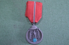 Награда, медаль "За зимнюю кампанию на Востоке 1941 / 1942" (мороженое мясо). Лента. Оригинал.