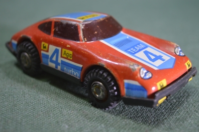 Игрушка машинка "Автомобиль Порше Porsche". ГДР. Германия. 1970е.