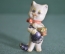 Игрушка фигурка "Кошка с корзиной цветов". Колкий пластик. ГДР. Германия. 1960е.